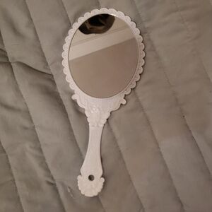White hand mirror